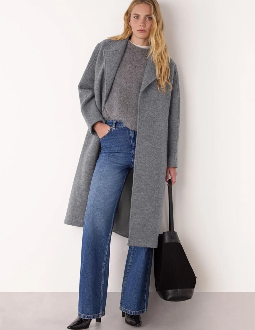 woman wearing funnel neck jumpers